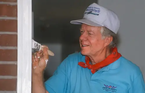 Jimmy Carter working on a Habitat for Humanity project in 1992