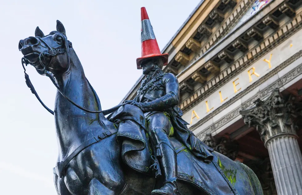 Best spring break trips in Europe: Cone-topped equestrian statue of the Duke of Wellington in front of the Gallery of Modern Art in Glasgow